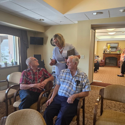 Residents visiting with our new President, Courtney Plantz